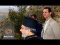 Syria's Assad pays Easter visit to recaptured Christian town Syria's Assad pays Easter visit to recaptured Christian town